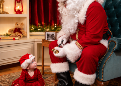 Baby and Santa at Santa's studio at Drummond Manor in Waterdown ON
